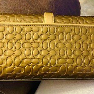 Coach Gold Leather Clutch
